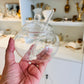 Transparent sugar pot with glass lid and matching spoon