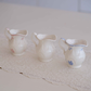 Premium Victorian ceramic milk creamer jug set featuring ivory, pink floral and blue floral designs, perfect for serving milk, cream and coffee at elegant tea parties.