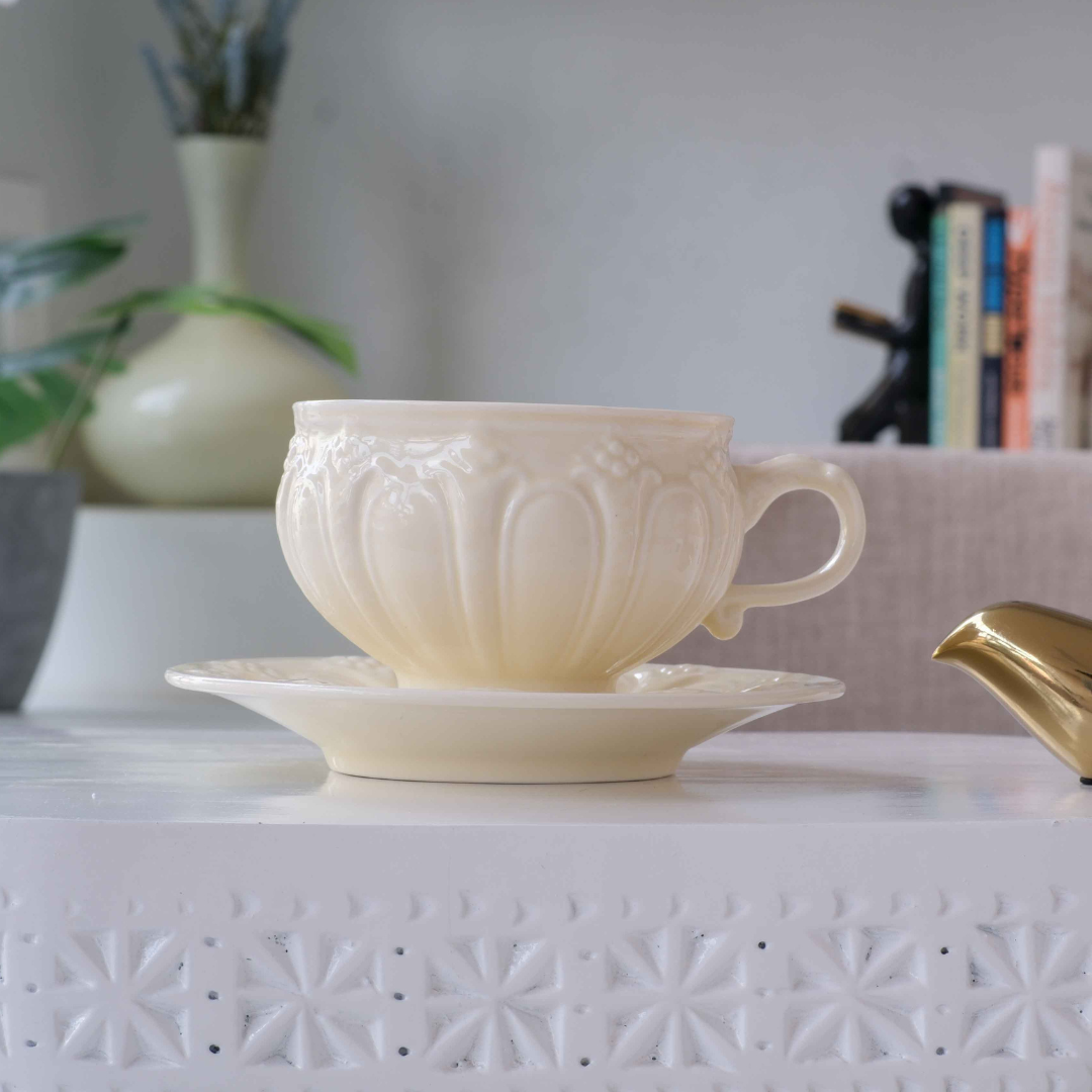 Elegant porcelain tea cup and saucer set for afternoon tea and coffee