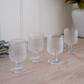 Retro-inspired textured drinking glasses with floral embossed detailing