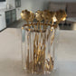 Elegant floral stainless steel stirrer in gold finish