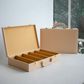 Gold 30-piece cutlery set with beige storage organiser for elegant dining    