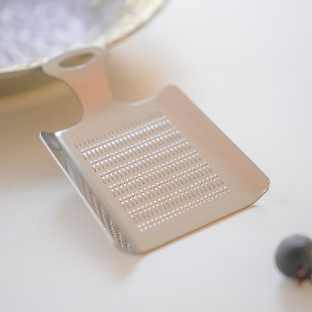 Dishwasher safe mini garlic grater
