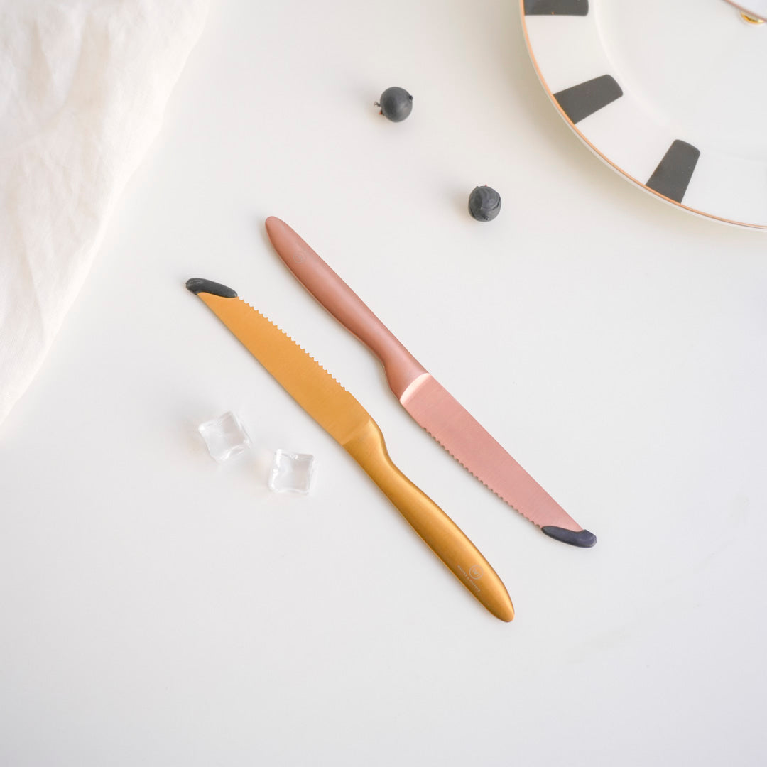gold and rose gold variety in steel knife