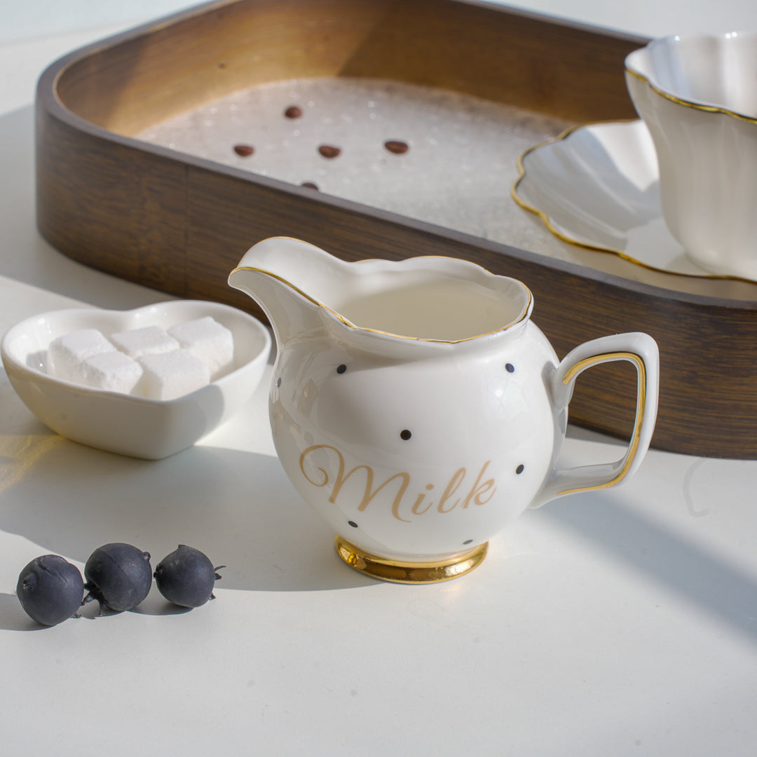 Porcelain milk creamer jug with gold rim – Whites & Pastels