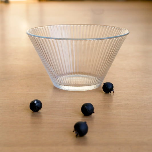Elegant fluted glass bowl for modern dining table