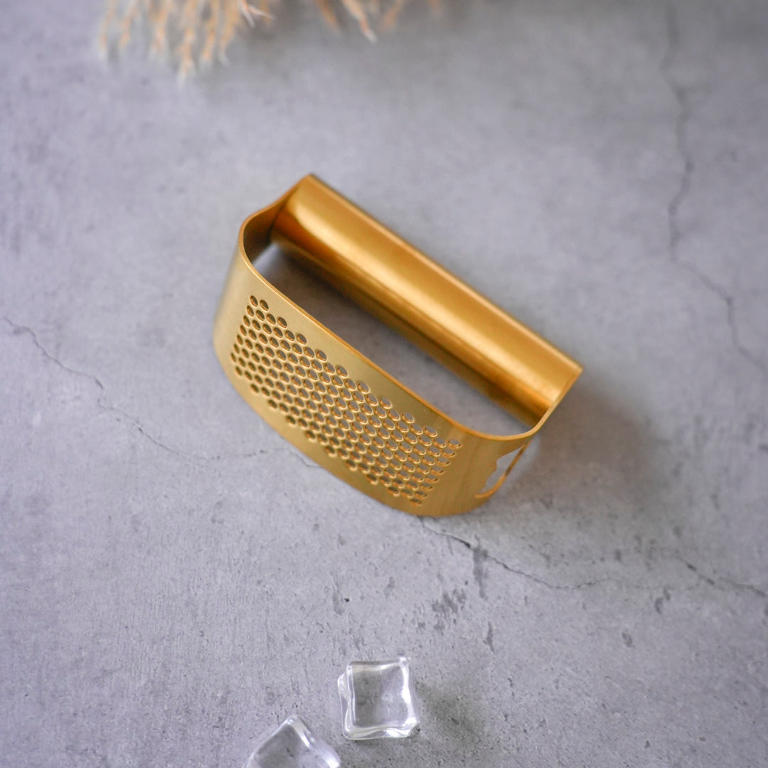 Luxury gold PVD garlic press by Whites & Pastels