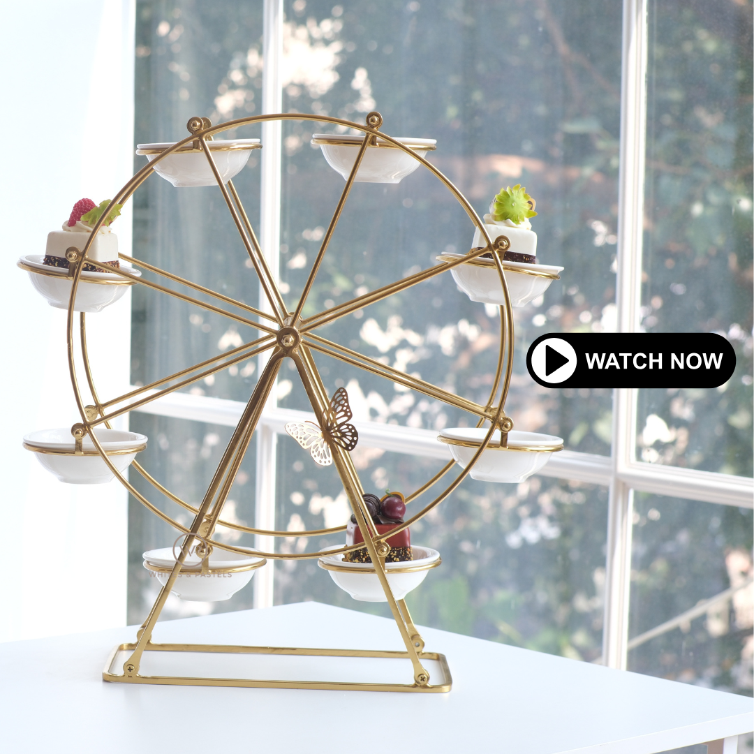 Ferris Wheel which rotates with desert in the bowls